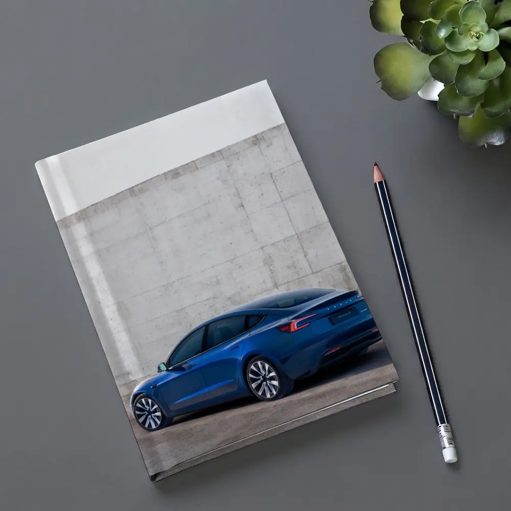 Tesla Model 3 Blue Against Concrete Wall – Notebooks