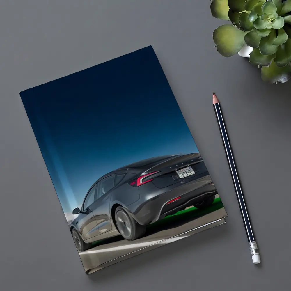 Tesla Model 3 Gray on City Highway – Notebooks