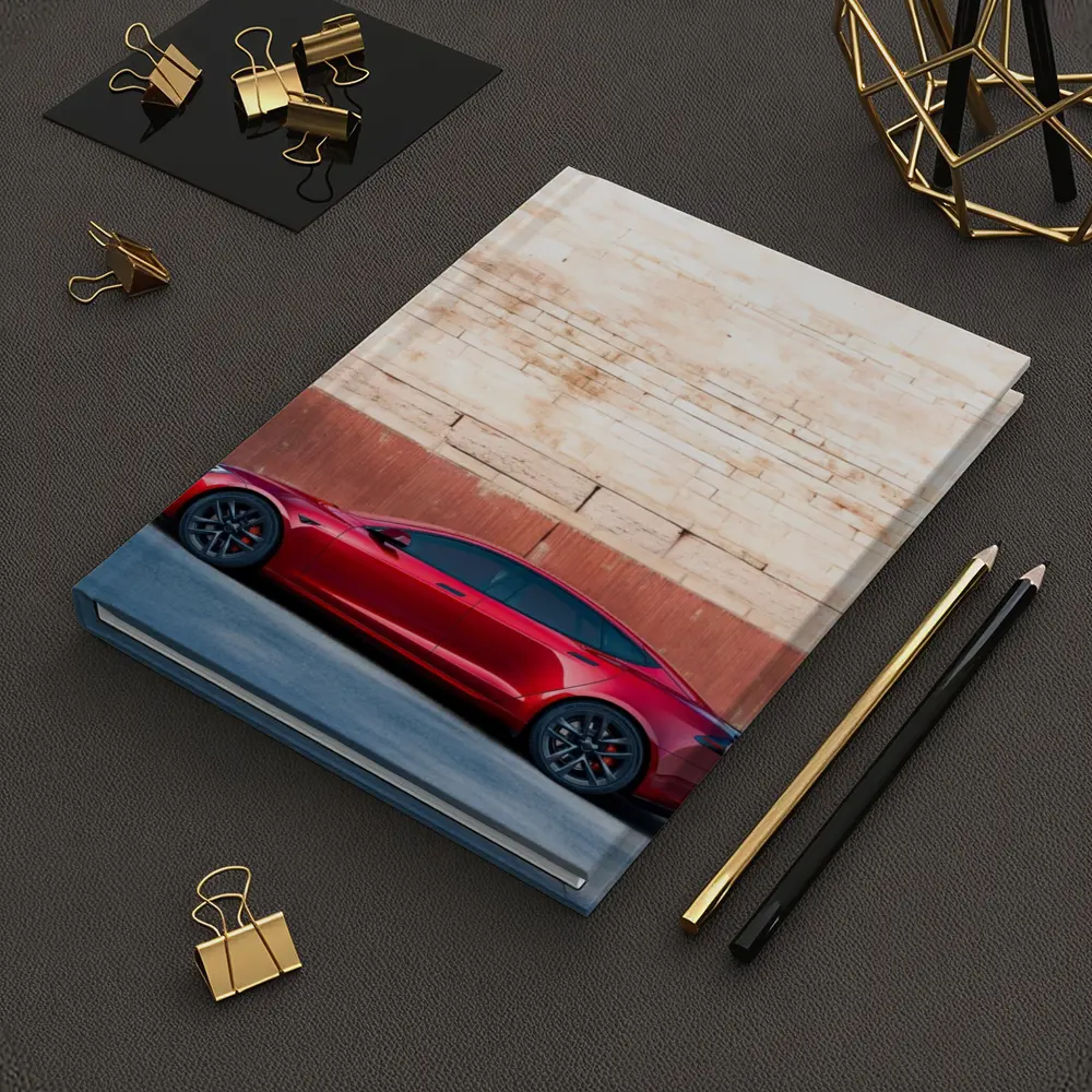 Red Tesla Model S Against Stone Wall – Notebooks