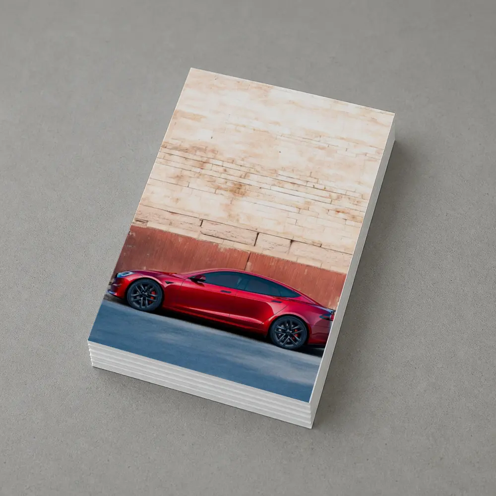 Red Tesla Model S Against Stone Wall – Postcards