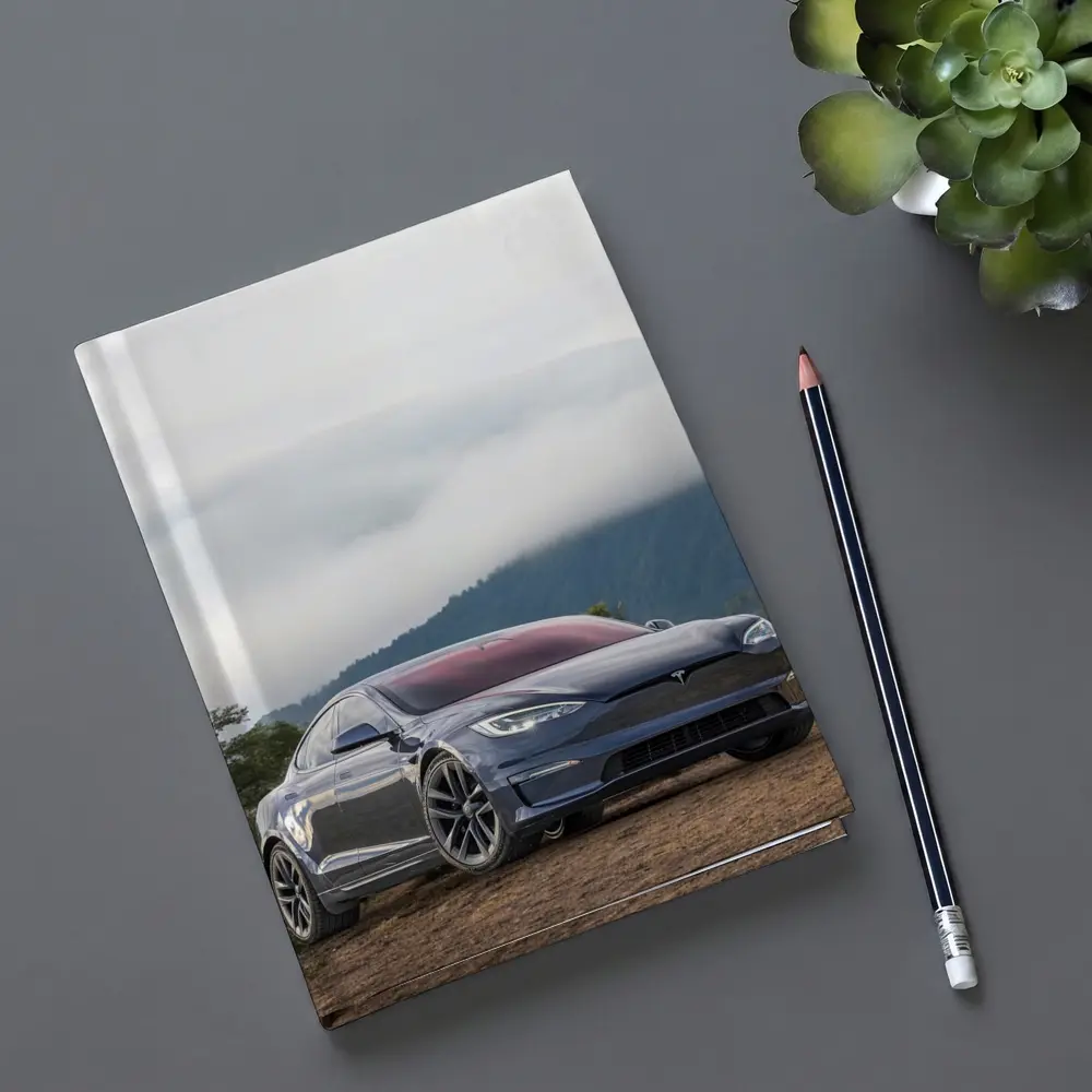 Tesla Model S Parked On Misty Mountain – Notebooks