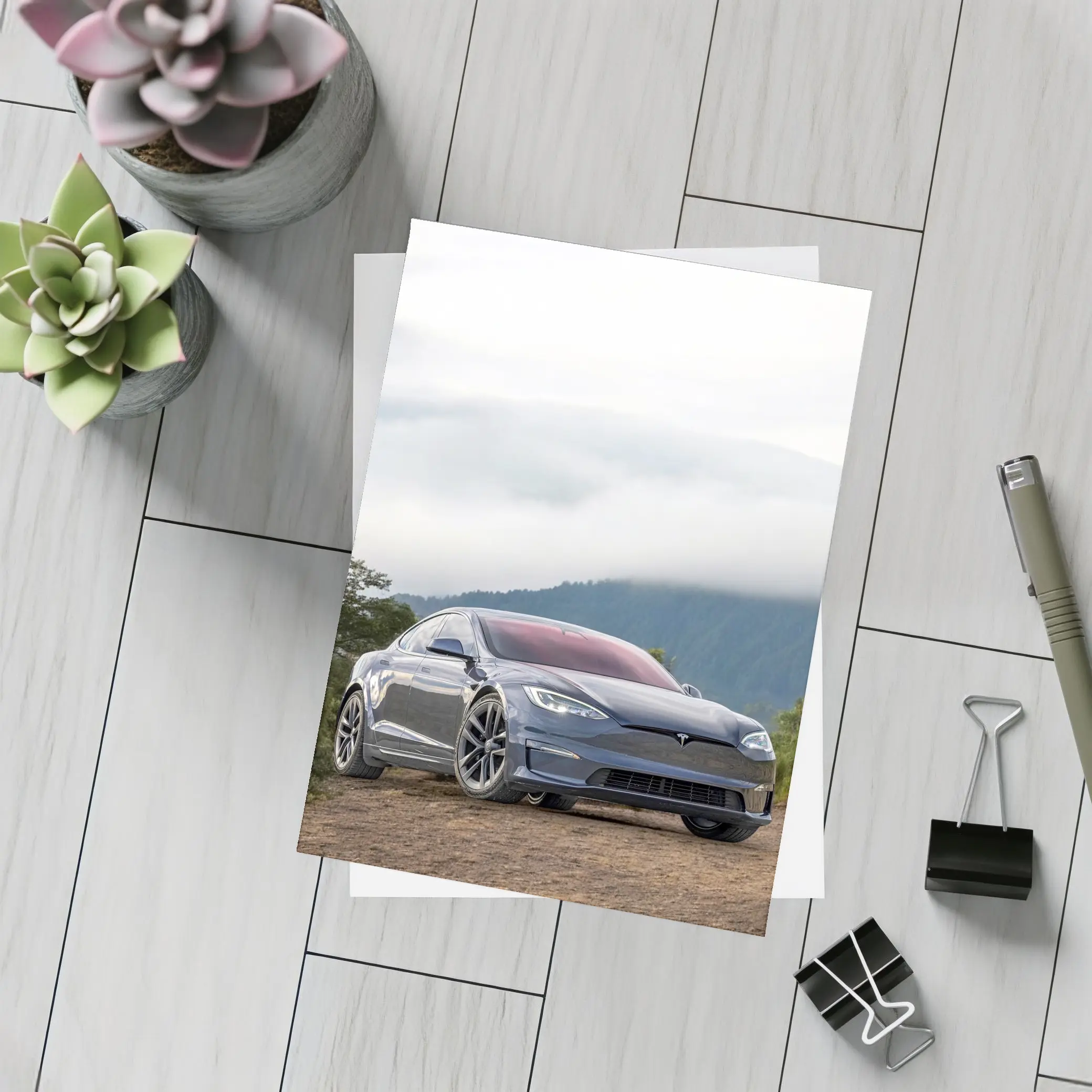 Tesla Model S Parked On Misty Mountain – Postcards