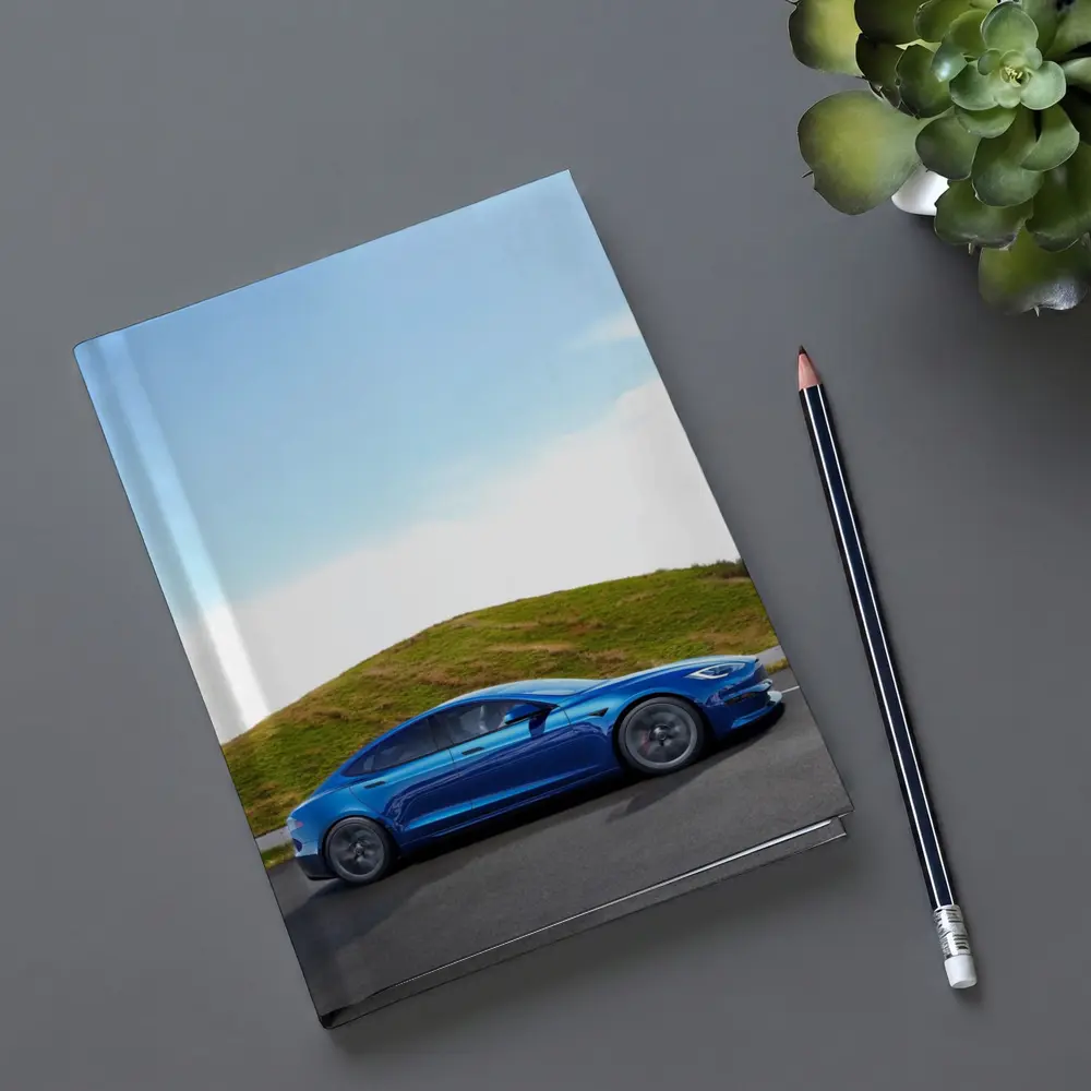 Tesla Model S Blue On Open Road – Notebooks