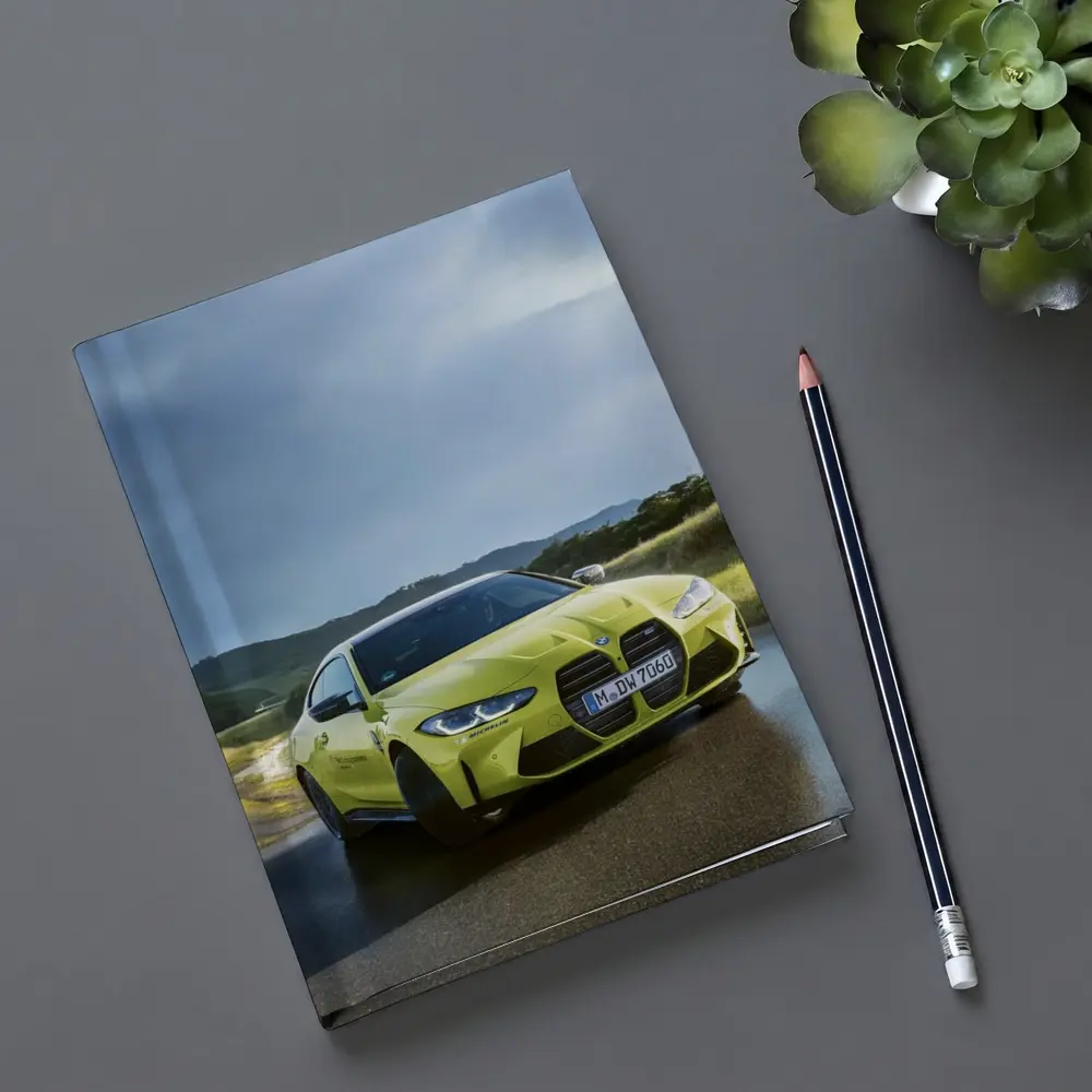 BMW M4 Competition Yellow on Wet Road – Notebooks