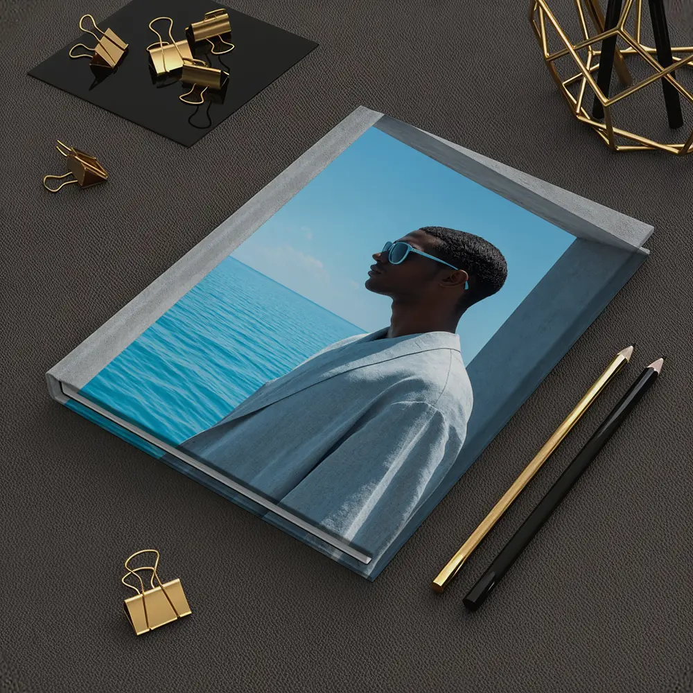 Man in Sunglasses by Ocean Doorway – Notebooks