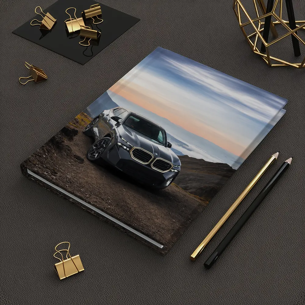 BMW XM SUV Mountain Road Dramatic Sky – Notebooks