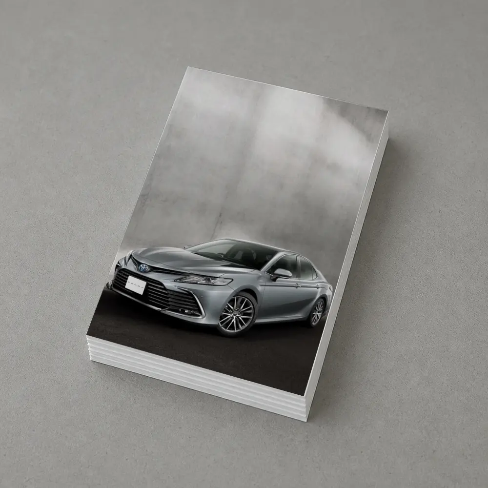 Toyota Camry Silver Sedan Against Gray Wall – Postcards