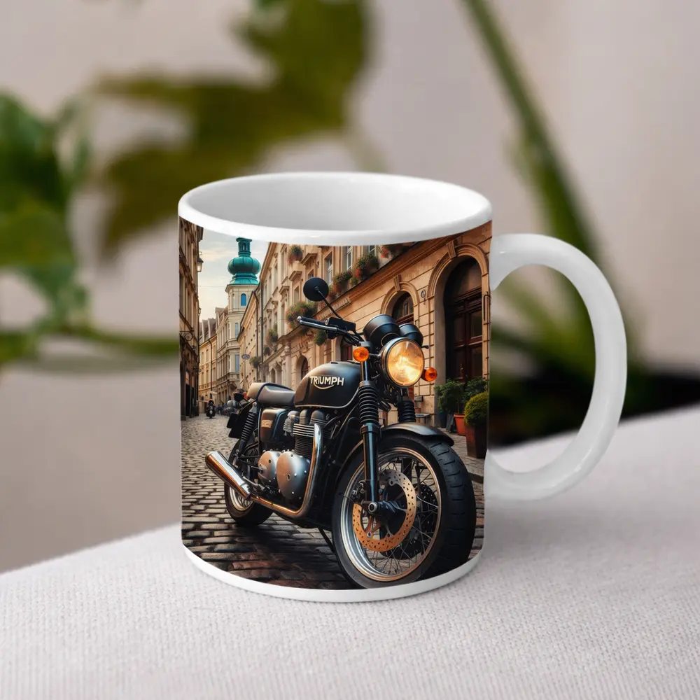 Triumph Motorcycle Parked on European Cobblestone Street – Mugs