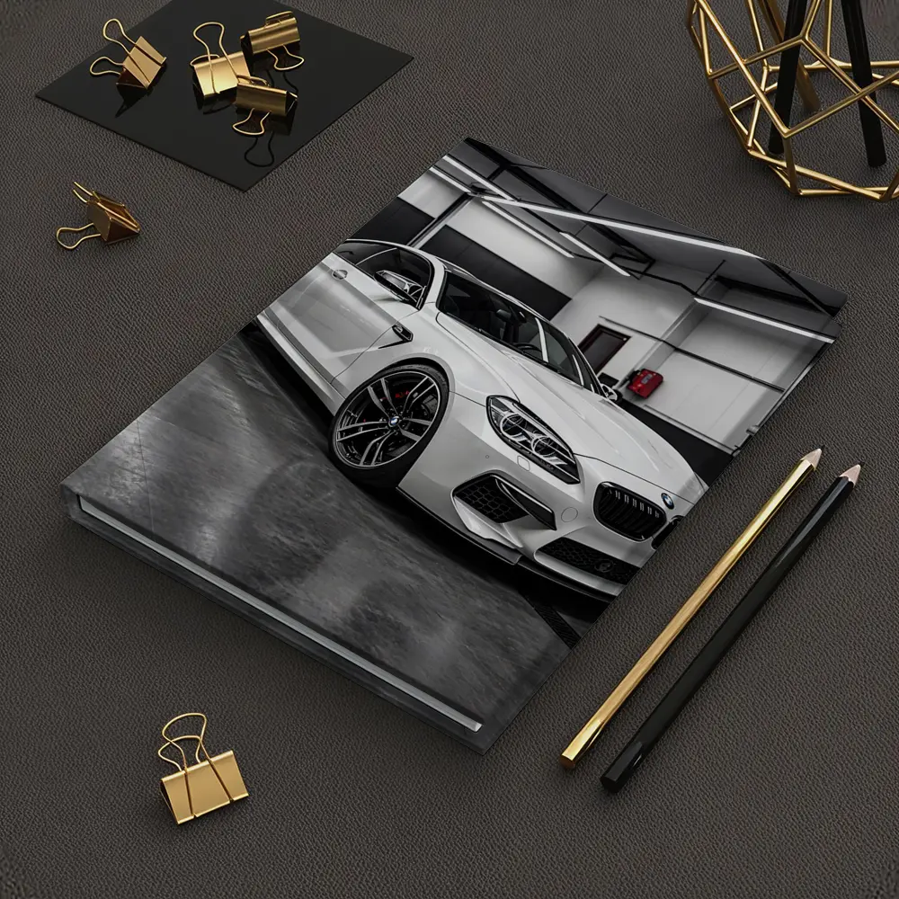 White BMW M6 Parked in Garage – Notebooks