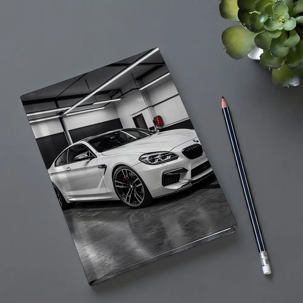 White BMW M6 Parked in Garage – Notebooks