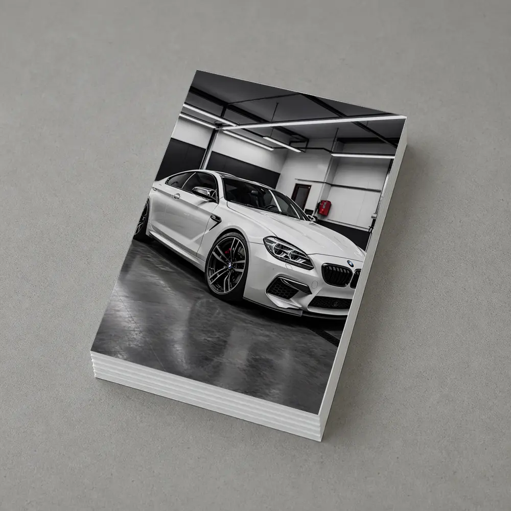 White BMW M6 Parked in Garage – Postcards