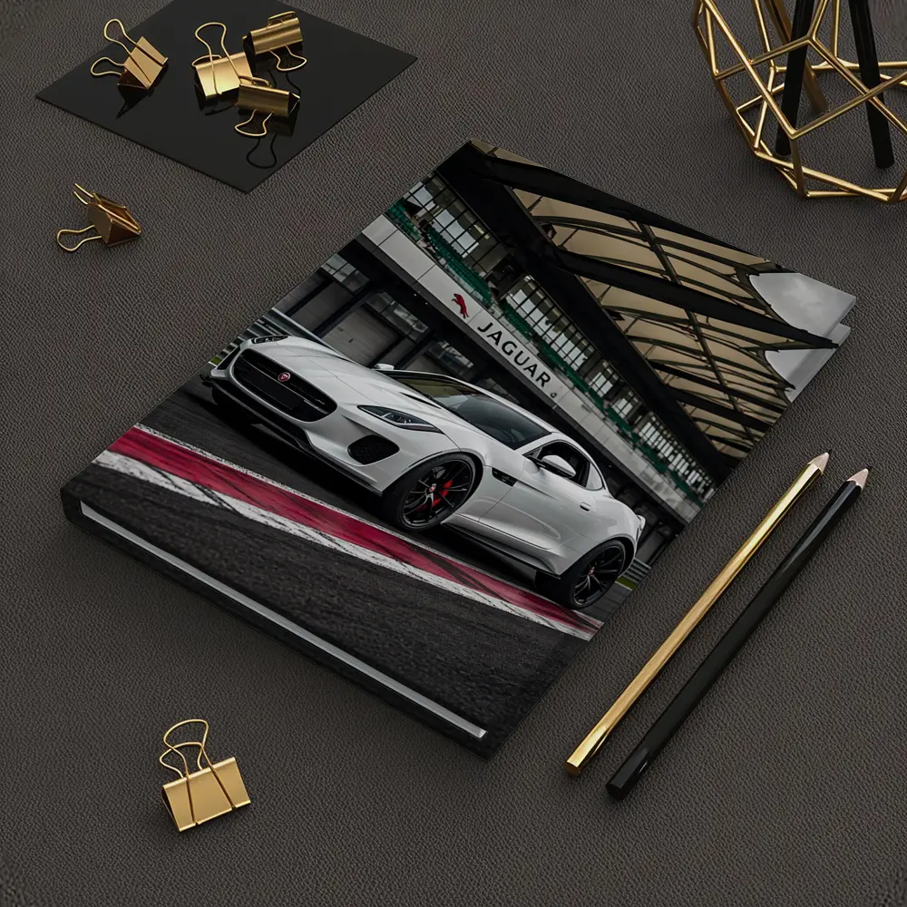 White Jaguar F-Type on Race Track – Notebooks