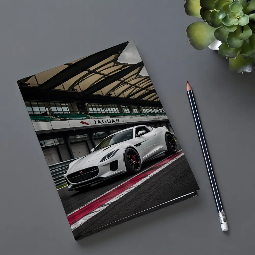 White Jaguar F-Type on Race Track – Notebooks