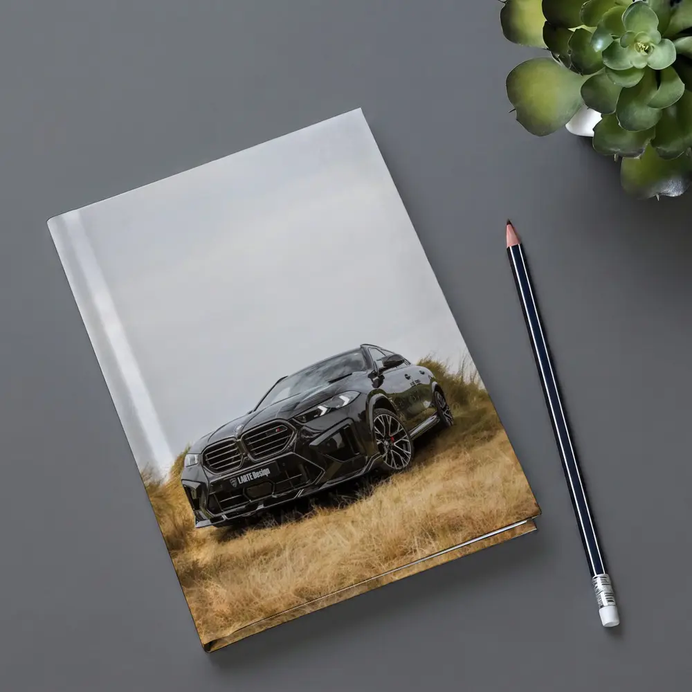 BMW X6M Black SUV Grass Field – Notebooks