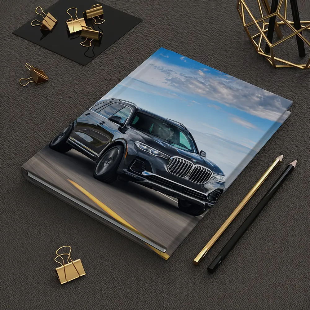 BMW X7 SUV Driving on Open Road – Notebooks