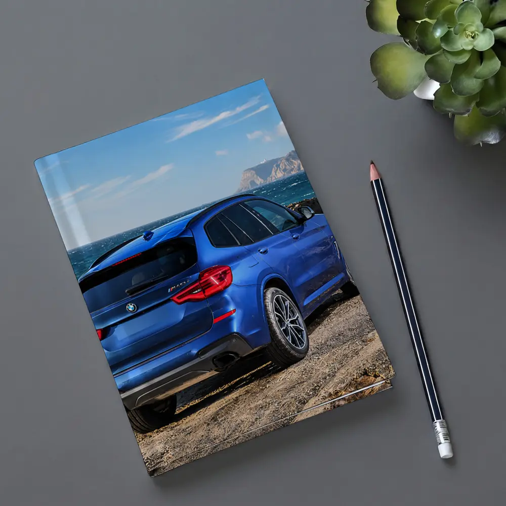 BMW X3 Blue SUV Rocky Coastal View – Notebooks