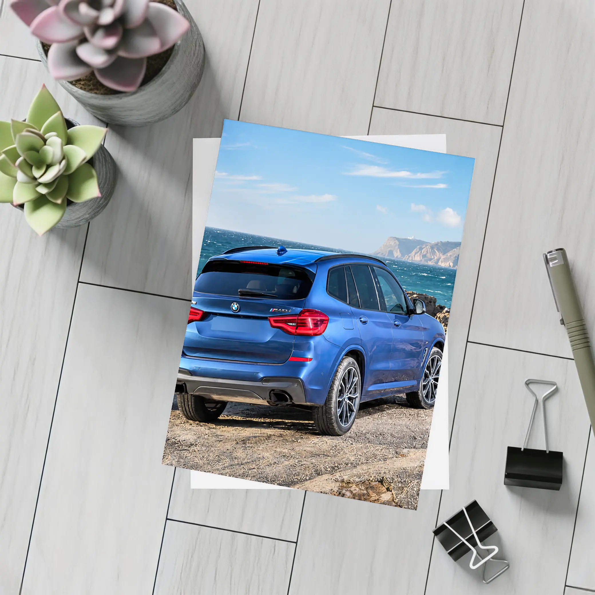 BMW X3 Blue SUV Rocky Coastal View – Postcards