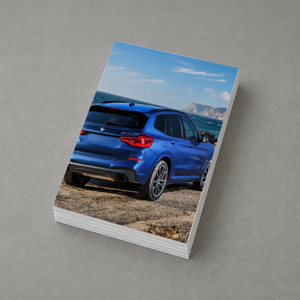 BMW X3 Blue SUV Rocky Coastal View – Postcards