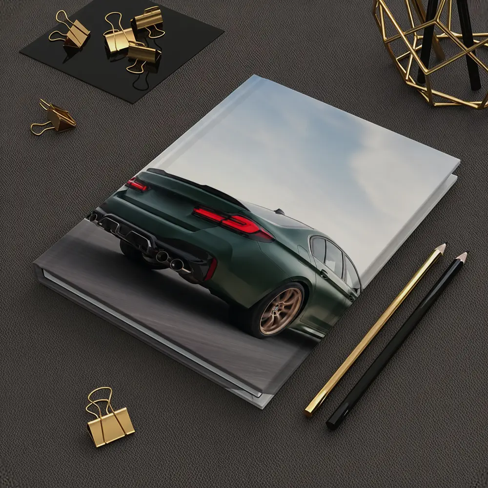 BMW M5 CS Green Sedan on Open Highway – Notebooks