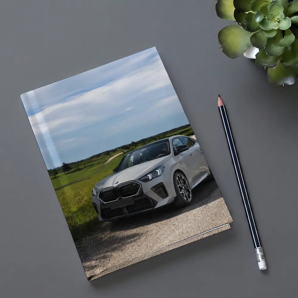 BMW X6M Silver on Rural Gravel Road – Notebooks