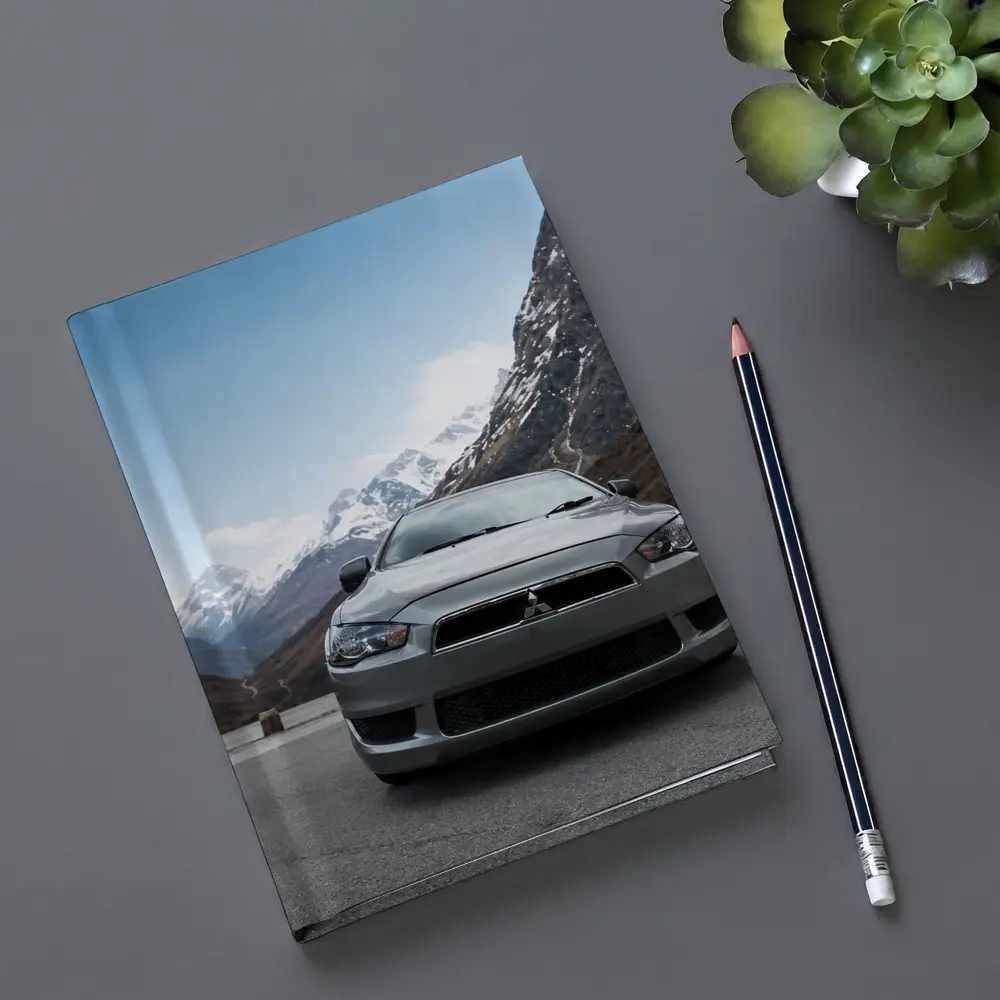 Mitsubishi Lancer Front View Snowy Mountains – Notebooks