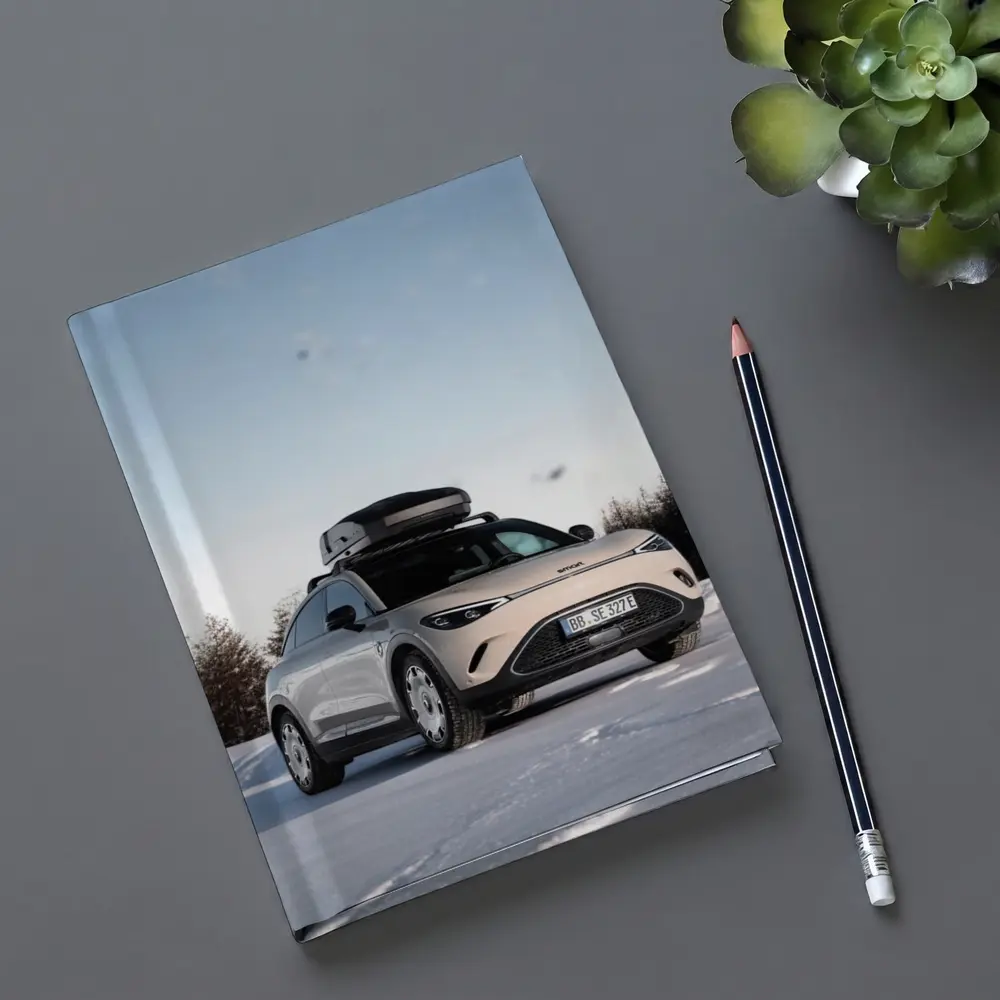 Smart Car Parked On Snowy Winter Landscape – Notebooks