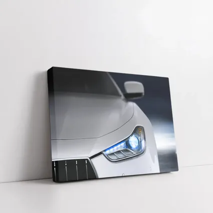 Maserati Ghibli White Headlight Close Up