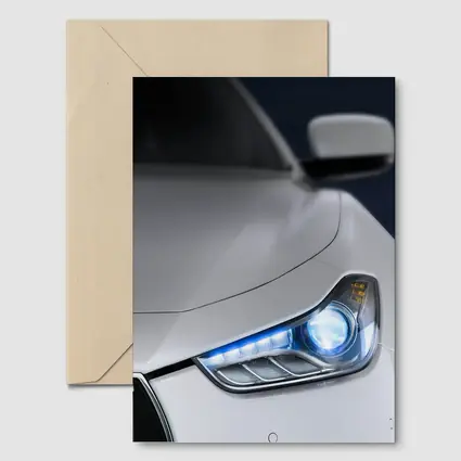 Maserati Ghibli White Headlight Close Up