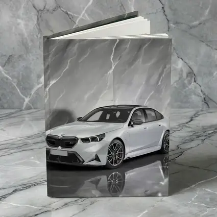BMW M5 Sedan Against Gray Marble Background