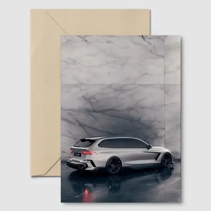 BMW M5 Touring Silver Against Marble Wall