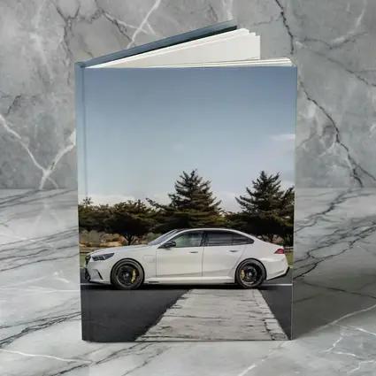 BMW M5 White Sedan On Track