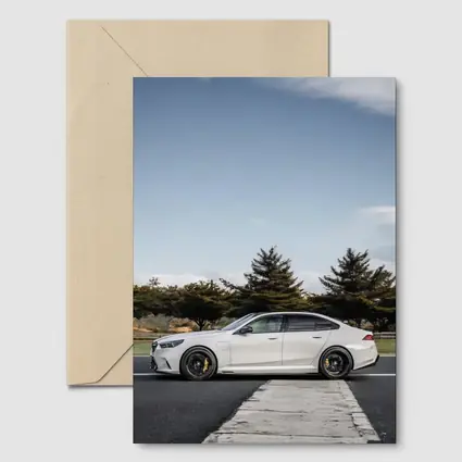 BMW M5 White Sedan On Track