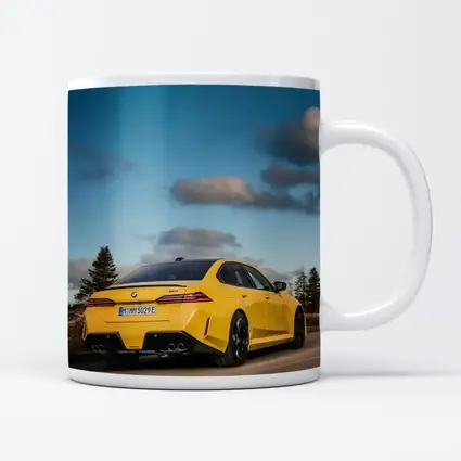 BMW M5 Yellow Sedan On Open Road