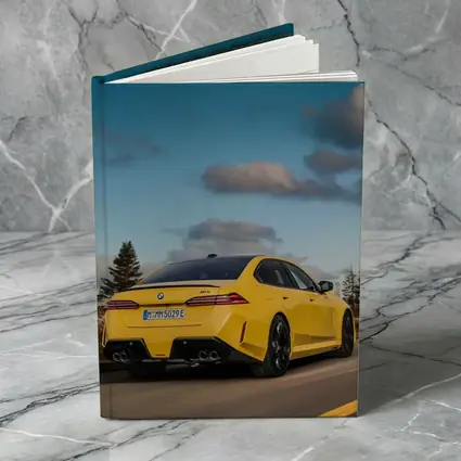 BMW M5 Yellow Sedan On Open Road