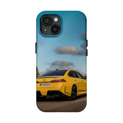 BMW M5 Yellow Sedan On Open Road