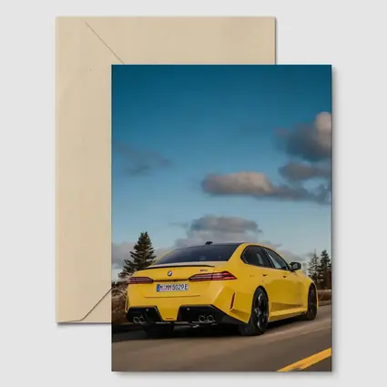 BMW M5 Yellow Sedan On Open Road