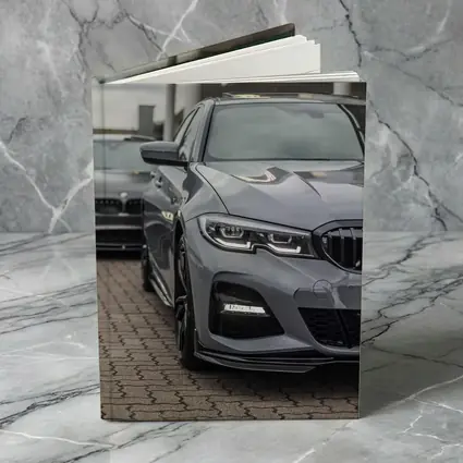 BMW 3 Series Gray Sedan Dealership Lot