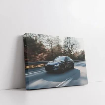 Black BMW M4 Speeding Through Forest Road