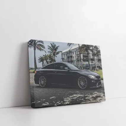 Black BMW M4 Coupe Coastal Urban Setting