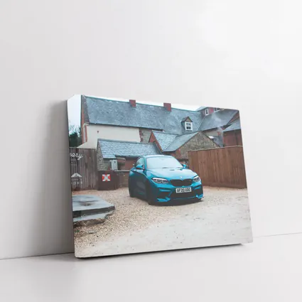 BMW M2 Blue Coupe Gravel Courtyard Setting