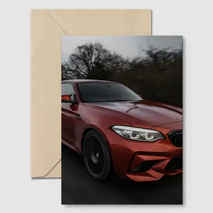 BMW M2 Coupe Racing On Wet Road