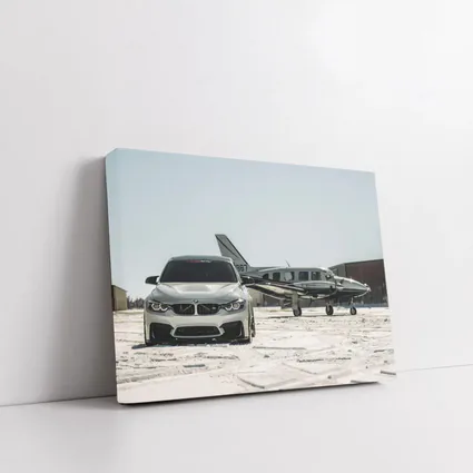 BMW M4 Silver Parked Near Private Jet