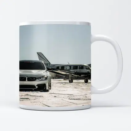 BMW M4 Silver Parked Near Private Jet