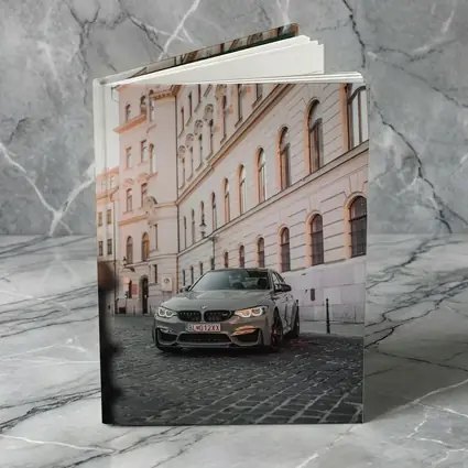 BMW M3 Gray Parked On Cobblestone Street