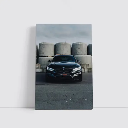 Black BMW M4 Front View Industrial Background