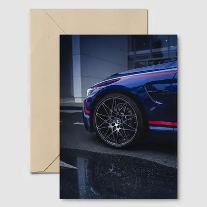 BMW M4 Blue Racing Stripes Wet Pavement