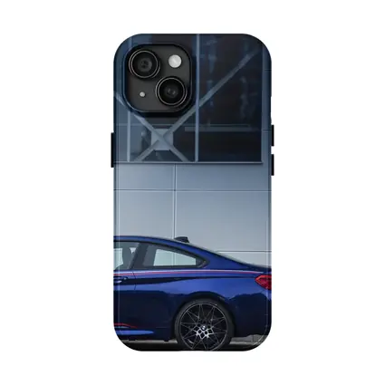 BMW M4 Blue Coupe Against Modern Building
