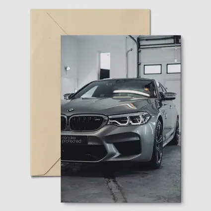 BMW M5 Gray Sedan Garage Close Up