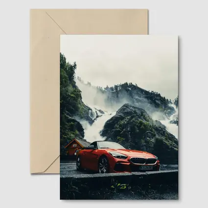 BMW Z4 Red Roadster Misty Waterfall Background
