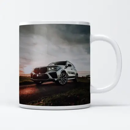 BMW X5M Silver SUV Dramatic Cloudy Sunset